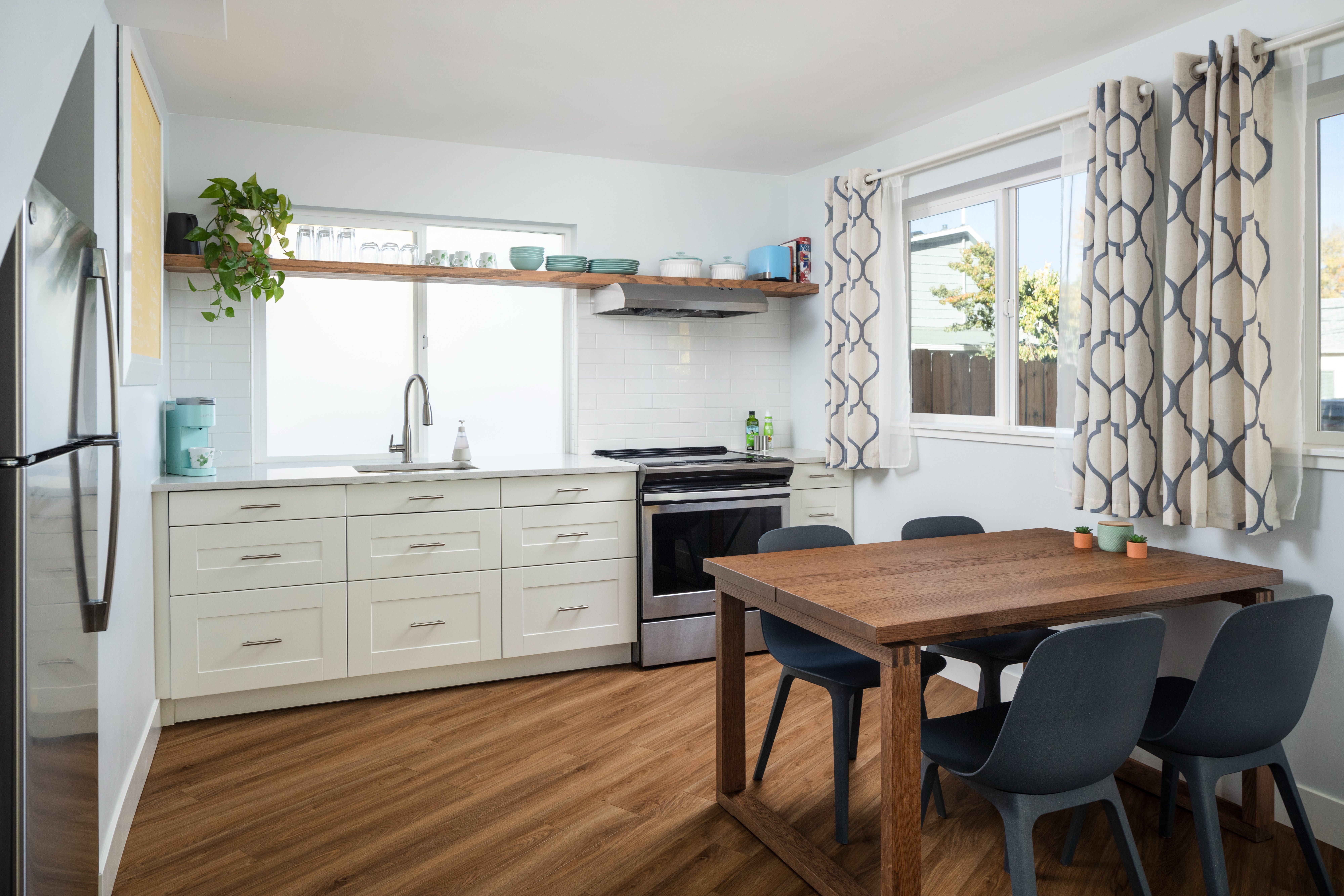ADU Lafayette Colorado — kitchen with open shelving, subway tile, and garden window, Old Town Lafayette, Intentional Architecture
